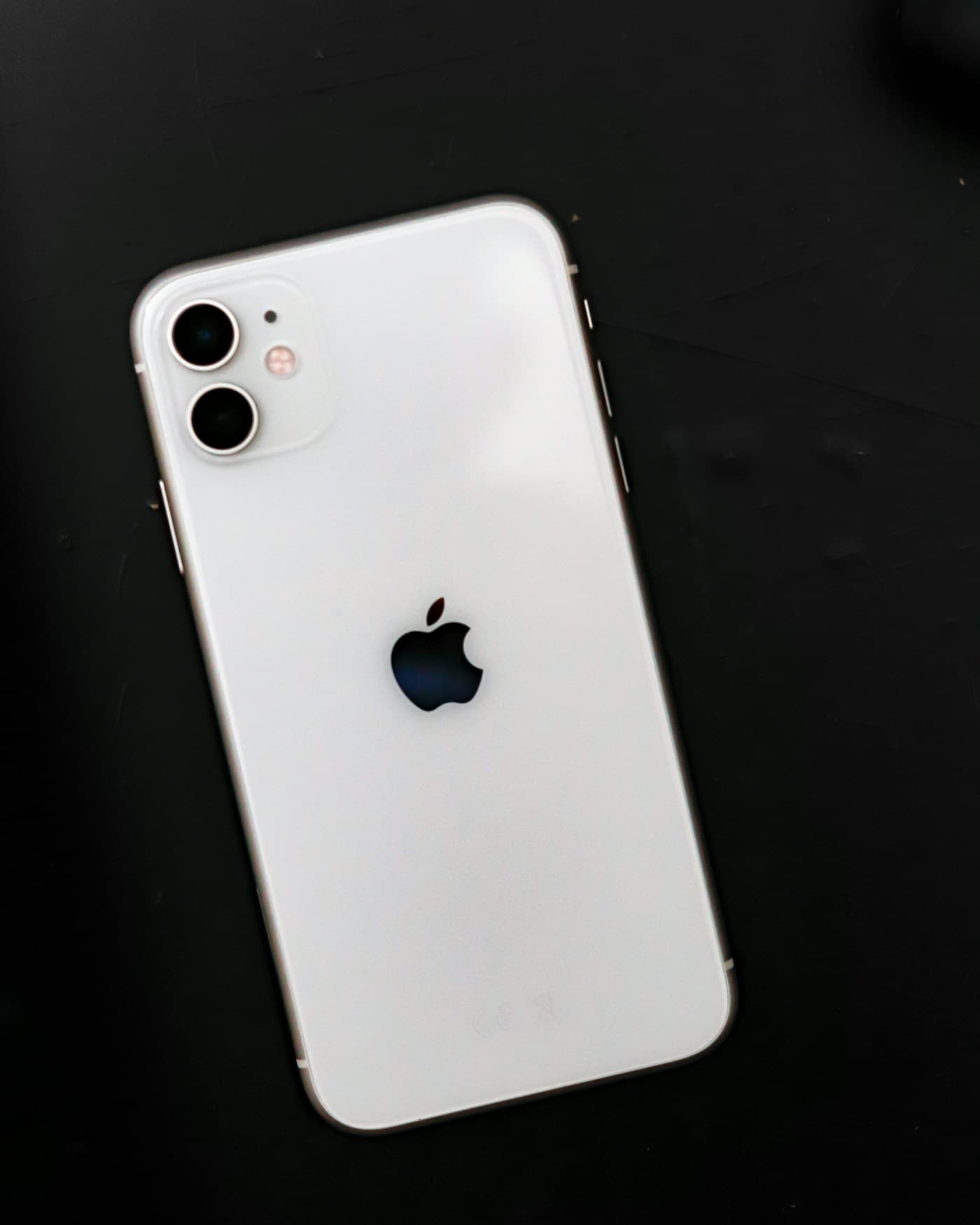 Premium Apple devices on a dark surface