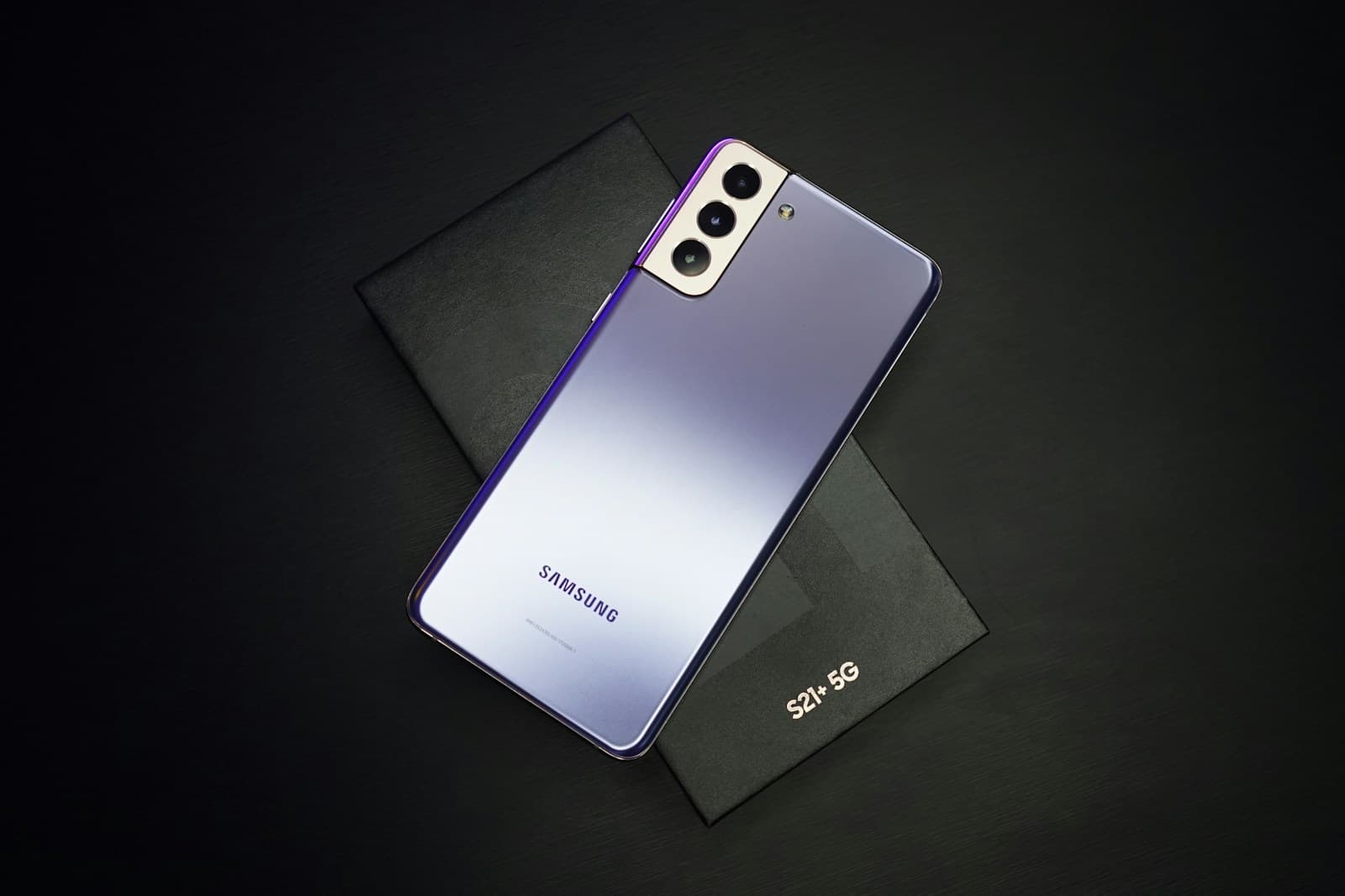 Samsung Galaxy style phone on a dark surface